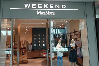 Оформление освещения в магазине одежды Weekend MaxMara